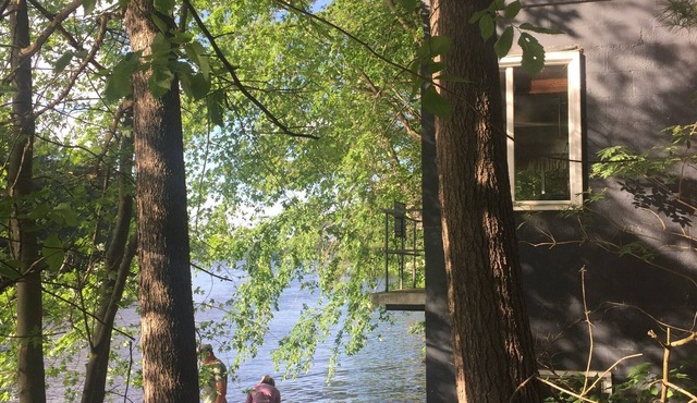 Cute, pet-friendly, house with hot tub overlooking the lake in Menomonie, WI.