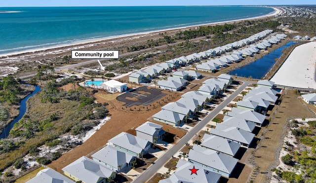 Cypress Sunshine is a 4BD/2BA home steps from north pool & beach boardwalk! Rent onsite golf cart!