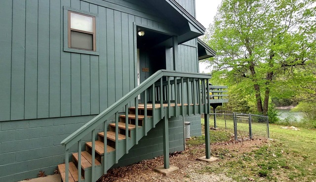 DECK OVERLOOKS THE PEACEFUL SERENITY OF THE LAKE