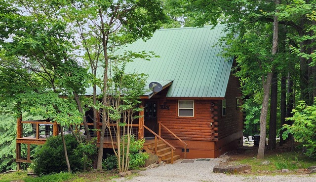 Deer Cabin Of Deer Lodge Cabin Rentals is a Secluded Ozark Cedar Log Cabin
