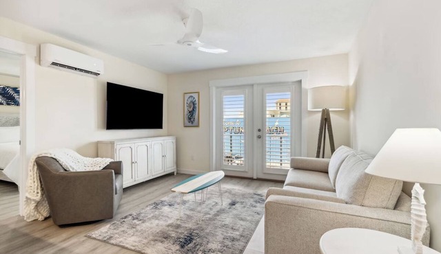 Delight in Ocean Views from Quaint Room in Beautiful Neptune Beach with Pool