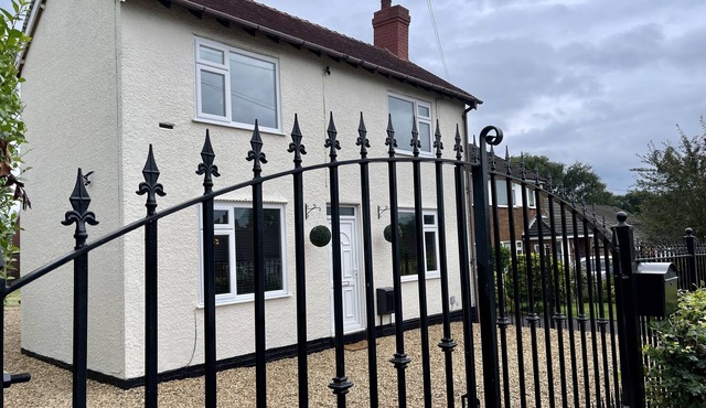 Delightful 2 bed detached home with secure parking