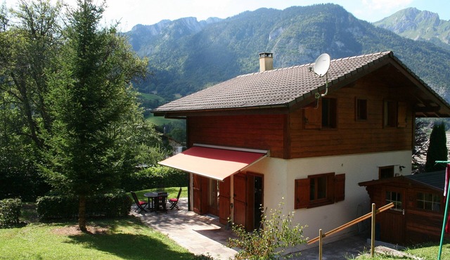 Delightful Chalet, village location, garden, parking, views and WiFi
