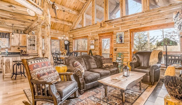 Delightful Riverfront Cabin with Wood-Burning Fireplace and Gas Grill & Hot Tub
