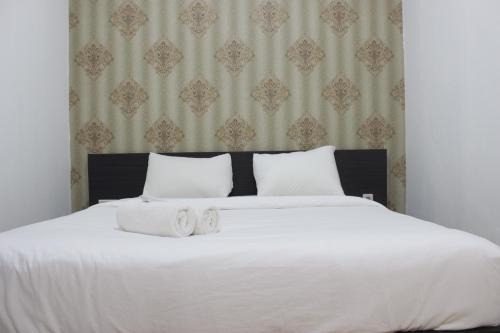 Deluxe & Comfy 2BR at Braga City Walk Apartment By Travelio