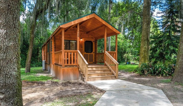 Deluxe Family Cabin with Porch - Happy Travelers RV Resort