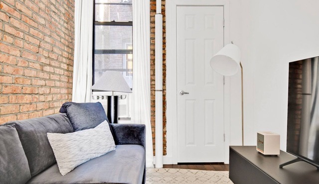 Deluxe LES 1BR w/W/D, steps to B/D Train & Park, by Blueground