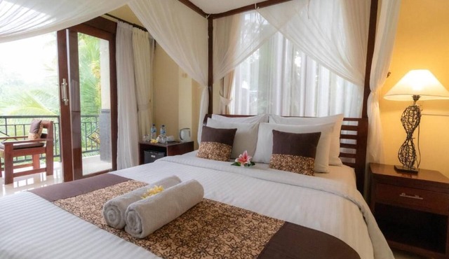 Deluxe room upper floor with pool & nature view