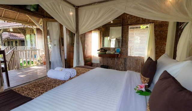 Deluxe room with pool view at Ubud