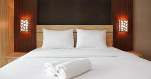 Deluxe Studio Room @ Tamansari La Grande Apartment By Travelio