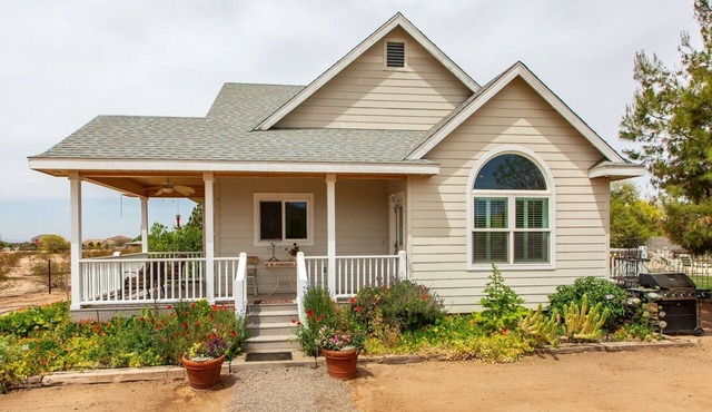 Desert Sky Cottage on 2 1/2 acres. Mountain views. Pool. Gated & fenced.