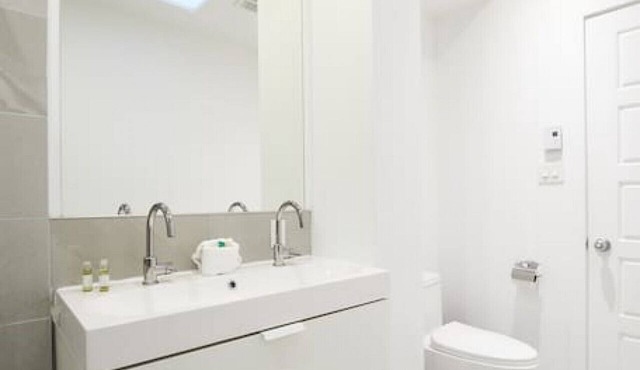 Design 3-bedroom flat with private terrace in Little Italy by Denstays