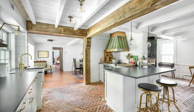 Designer 5-bedroom farmhouse in charming Brookhaven Hamlet w/pool & hot tub