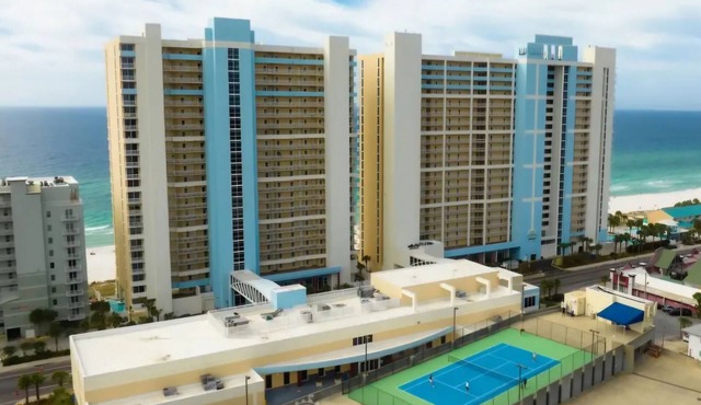 Designer BEACHFRONT 3 BR 2 BA Majestic family condo, 5 pools, amenities galore!