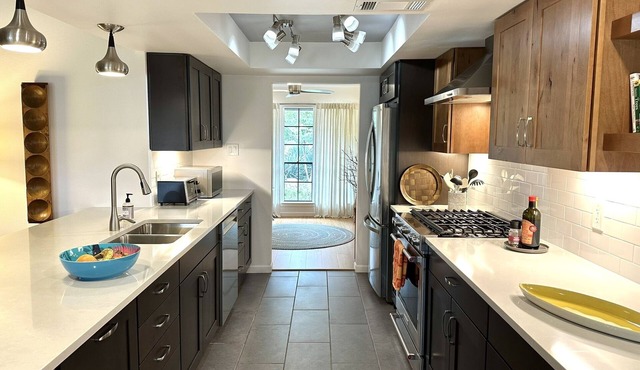 Designer bedroom & bath in creatively renovated 70s ranch. Pkg, grill, patios.