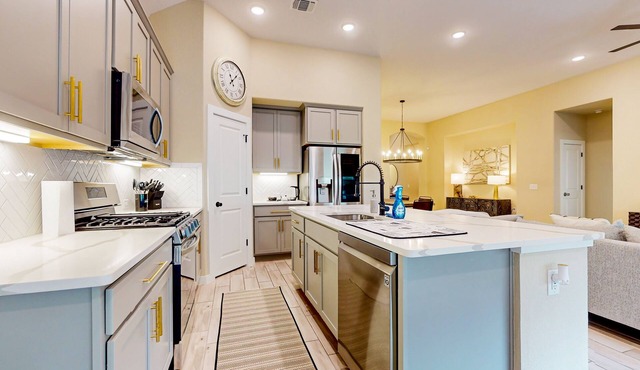 Designer home with luxe suite, home office, outdoor lounge & dog-friendly yard