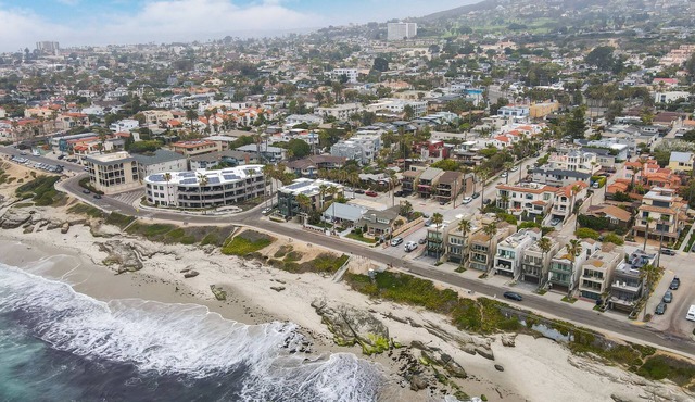Designer Luxury Coastal Home with Panoramic Ocean Views, Rooftop Deck, & Fire Pit
