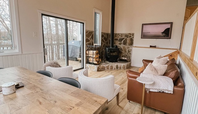 Designer waterfront, south facing cabin on deep clean lake.