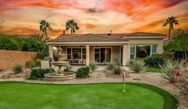 Desirable 2BR, 2BA house with breathtaking views, putting green, and golf cart!n