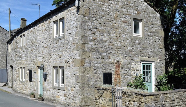 Detached barn conversion with side terrace overlooking the river.