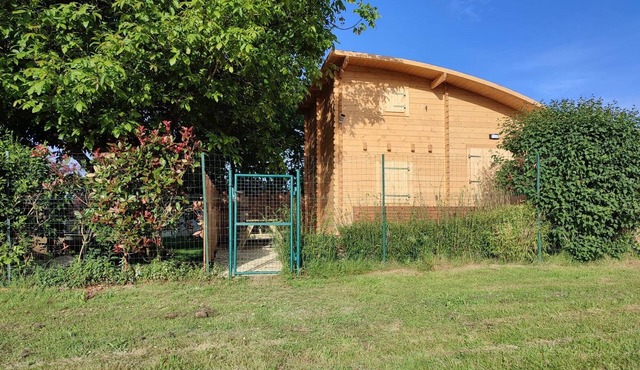 Detached chalet with unobstructed view of natural surroundings.