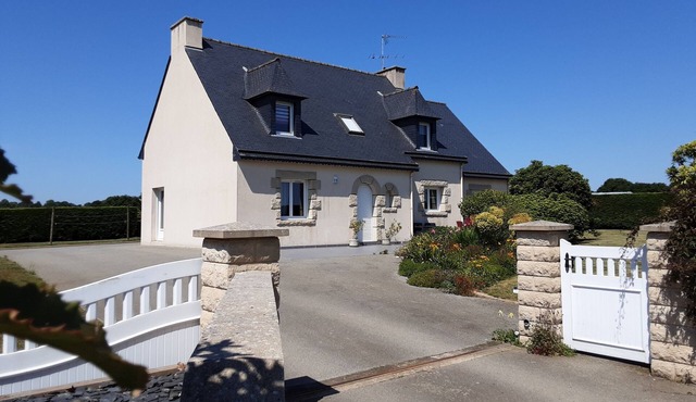 Detached house between sea and countryside