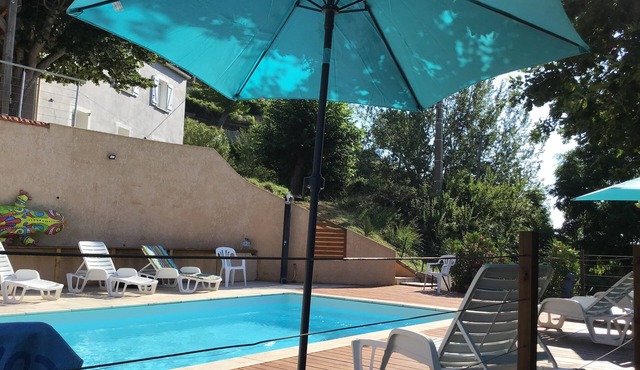 Detached house divided into 4 fully-equipped apartments.