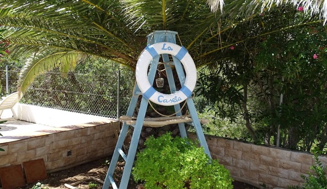 Detached house with private pool next to the beach