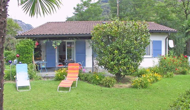 Detached house with sunbathing lawn on the edge of the village and near the River Maggia