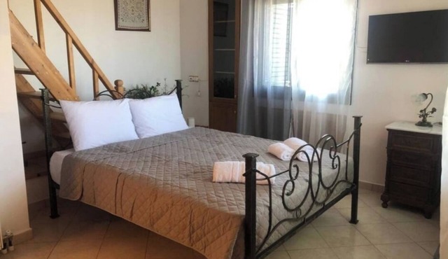 Detached maisonette House with two verandas, and full furnitured.