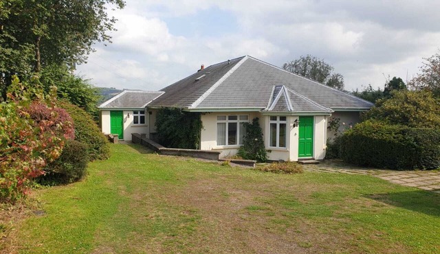 Detached rural bungalow, with sunroom, parking and enclosed garden