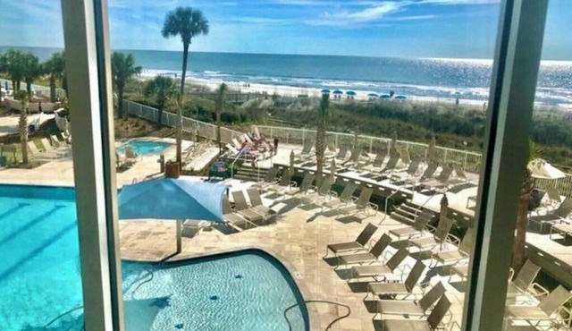 Direct Beachfront & Poolside Must See Renovation