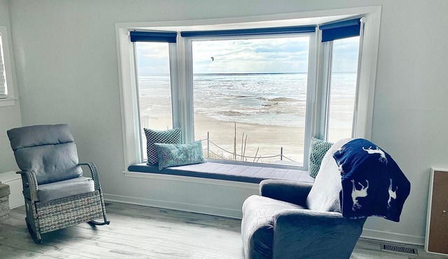 Direct beachfront home with stairs to private beach!