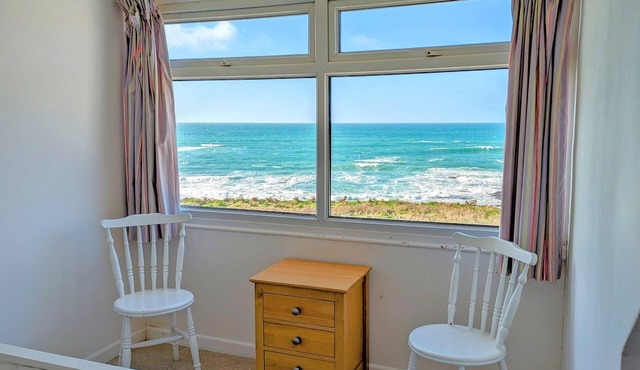Direct expansive sea views from every room and the garden.