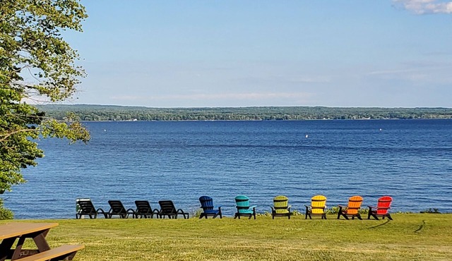 Direct Lakefront Retreat with private beach, dock and lakeside fire pit