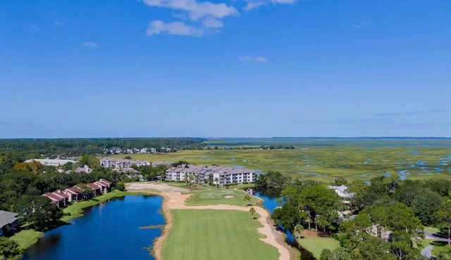 Direct Marshlands Views + Golf. Pool. Restaurant.