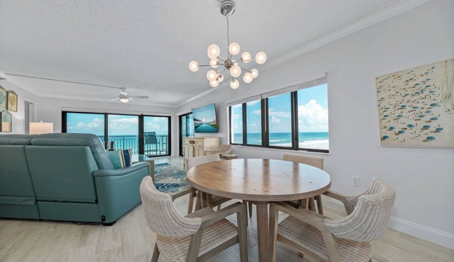 Direct oceanfront southern corner 2/2 condo with large wrap-around balcony and heated pool