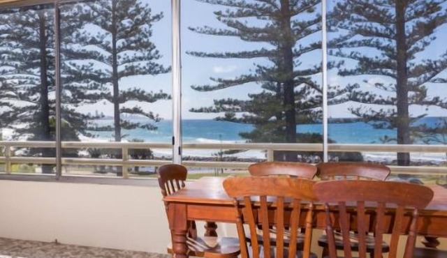 Directly across the road from Burleigh Beach.