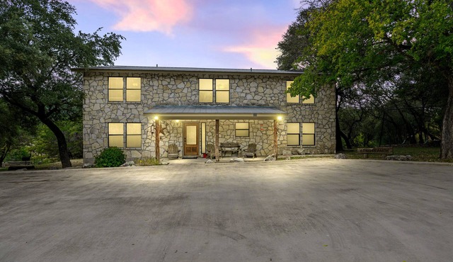 Directly ON the Frio River with exclusive river frontage, shuffleboard table & room for 25 guests