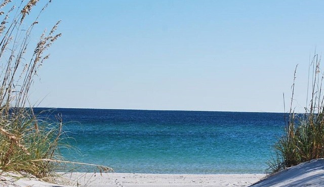Directly on the Gulf, larger end unit, both bedrooms have water view!