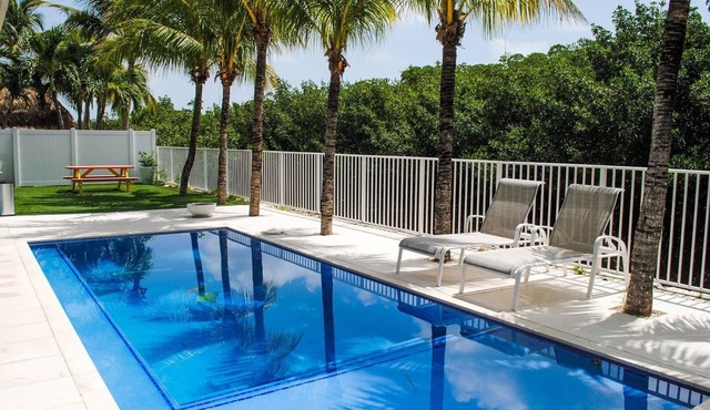 Discover comfort at 139 Venetian Way, a spacious 4BR getaway in Islamorada.