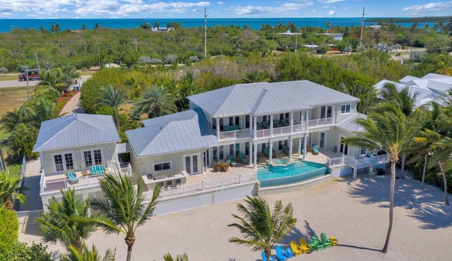 Discover luxury in this 5-bedroom exquisite oceanfront pool home in beautiful Islamorada.
