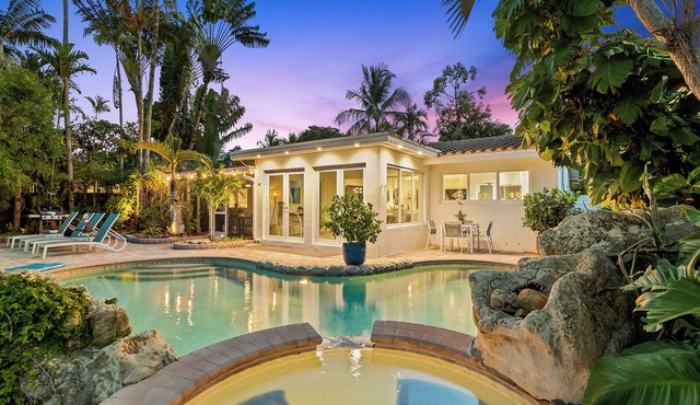 Discover Pineapple Paradise, a Stylish Modern Tropical Waterway Retreat with Poolside Relaxation!