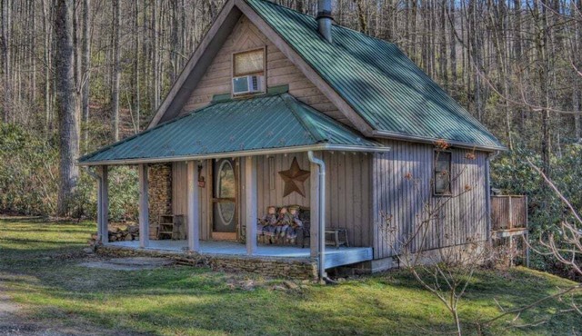 Discover tranquility at Creekside Waterfalls, a cozy 1-bedroom cabin in Fleetwood, NC.