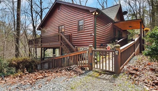 Discover tranquility at Hidden Oasis, a charming home nestled in serene Cherry Log Mountain