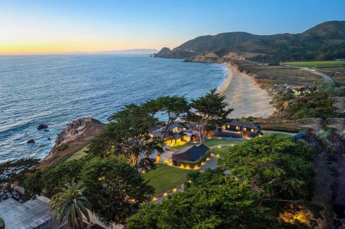 Distinguished Oceanfront Point Estate with Iconic Beach Mountain Vistas