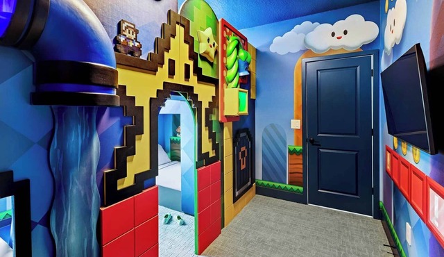 Divine Dreamland | Deluxe I-Drive mansion w/video game theme RM, pool, theater