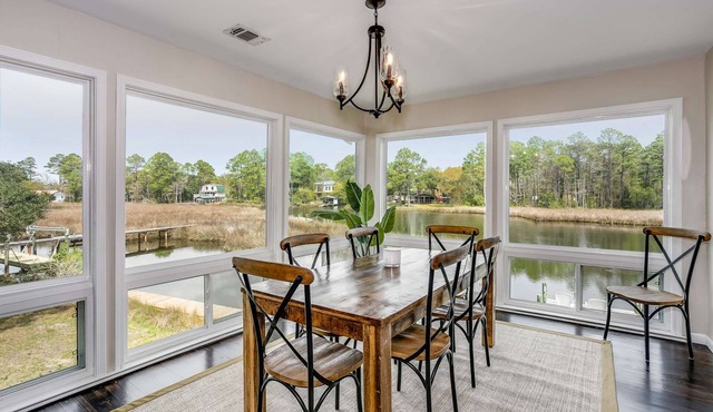 Dock Your Boat at this Serene Tarklin Bay Waterfront Home & Cruise on the Bayou | Remodeled