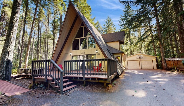 Dog-friendly, A-frame cabin with private hot tub - tranquil setting near skiing