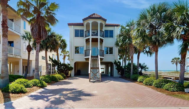 Dog-friendly beachfront home with private hot tub, fireplace, on-site pool, AC